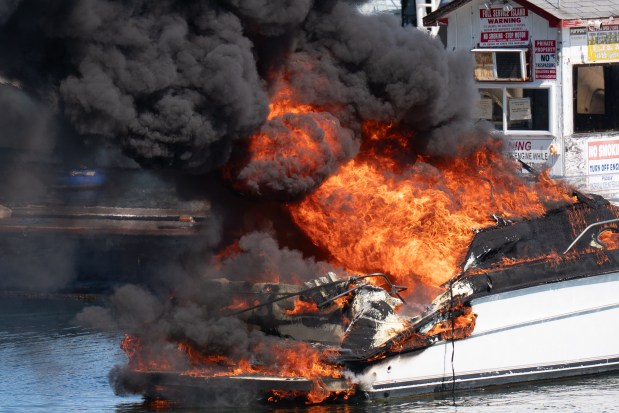 An explosion destroyed a boat that was docked at the City Island Marina in the Bronx on Saturday August 29, 2026. 1356. (Theodore Parisienne / New York Daily News)