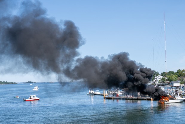 An explosion destroyed a boat that was docked at the City Island Marina in the Bronx on Saturday August 29, 2026. 1356. (Theodore Parisienne / New York Daily News)