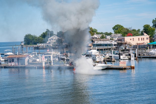 An explosion destroyed a boat that was docked at the City Island Marina in the Bronx on Saturday August 29, 2026. 1356. (Theodore Parisienne / New York Daily News)