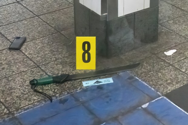 A machete is pictured on the subway platform after cops shot and killed a man who slashed three elderly commuters on the uptown 4/5/6 subway platform inside Grand Central Terminal on E. 42nd St. near Park Ave. in Manhattan on Saturday, April 11, 2026. (Theodore Parisienne / New York Daily News)
