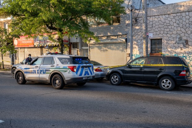 Police invesigate after Jose Scott was fatally stabbed on Merrick Blvd. near 221st St. in Queens on Sunday, Aug. 23, 2026. (Theodore Parisienne / New York Daily News)