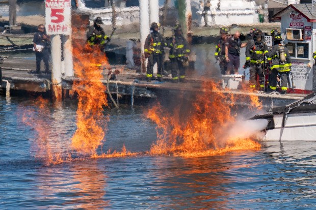 An explosion destroyed a boat that was docked at the City Island Marina in the Bronx on Saturday August 29, 2026. 1356. (Theodore Parisienne / New York Daily News)