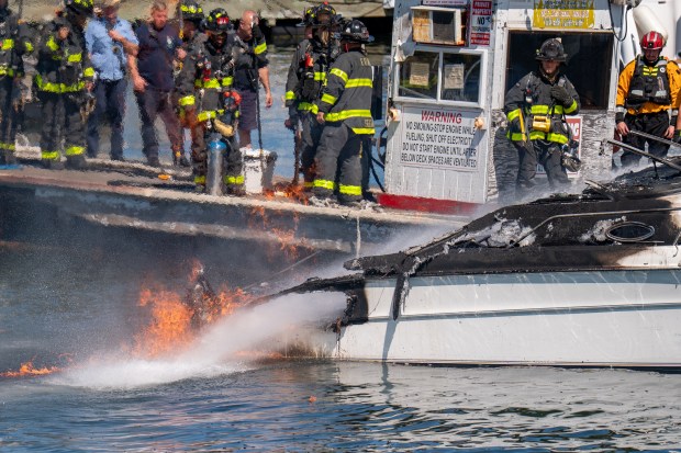 An explosion destroyed a boat that was docked at the City Island Marina in the Bronx on Saturday August 29, 2026. 1356. (Theodore Parisienne / New York Daily News)