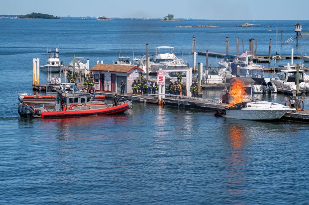 An explosion destroyed a boat that was docked at the City Island Marina in the Bronx on Saturday August 29, 2026. 1356. (Theodore Parisienne / New York Daily News)