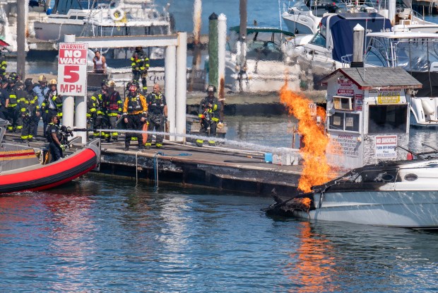 An explosion destroyed a boat that was docked at the City Island Marina in the Bronx on Saturday August 29, 2026. 1356. (Theodore Parisienne / New York Daily News)