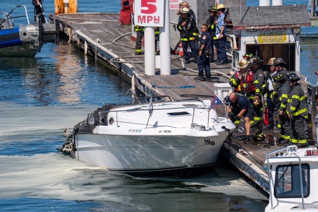 An explosion destroyed a boat that was docked at the City Island Marina in the Bronx on Saturday August 29, 2026. 1356. (Theodore Parisienne / New York Daily News)