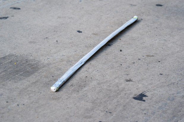 Police investigate after a 66-year-old man was fatally struck by a hit-and-run driver while crossing 9th Ave. mid-block near W. 55th St. in Hell's Kitchen, Manhattan, on Saturday, Aug. 8, 2026. (Theodore Parisienne / New York Daily News)