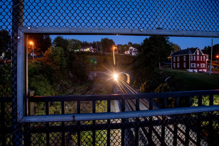 A train exits a tunnel in Cambria County. PennDot, Norfolk Southern and Amtrak have been working together to expand passenger service between New York and Pittsburgh.