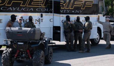 Federal agents at the Cato ice raid.