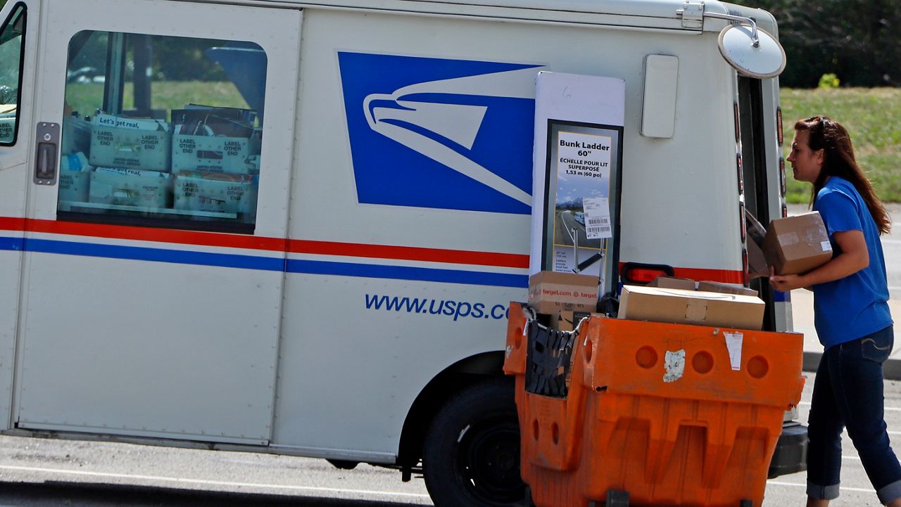 Voting rights groups sue over USPS mail-in ballot rule