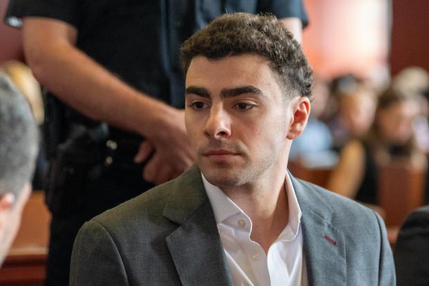 Luigi Mangione appears for a pre-trial hearing at Manhattan Criminal Court.