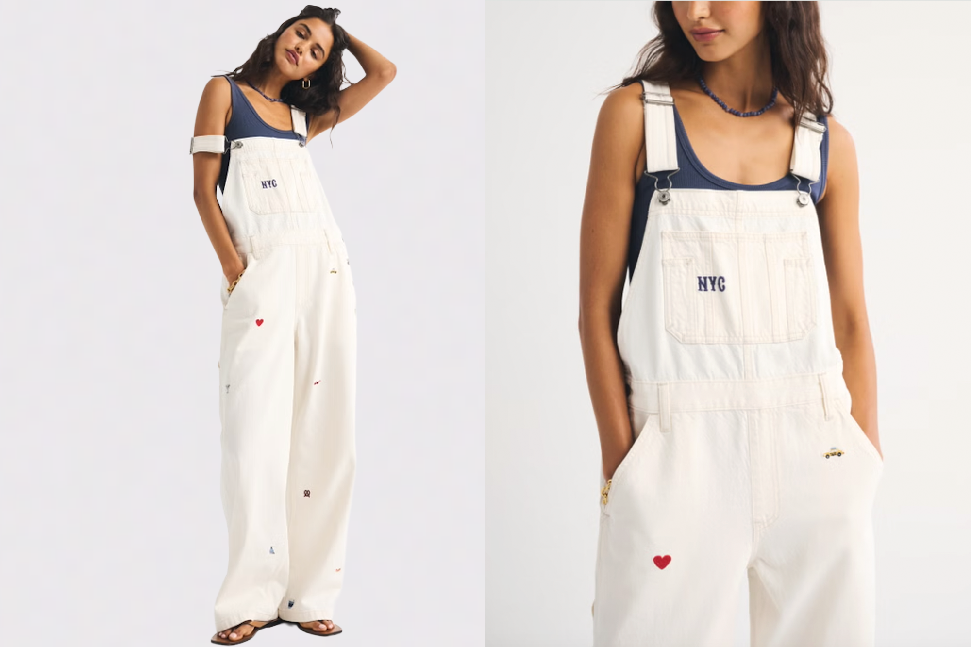 Woman in white overalls with "NYC" embroidered on the bib and various small embroidered motifs, paired with a navy tank top.