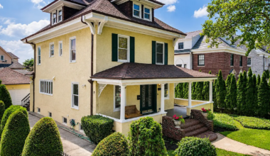 stucco covered house with front porch