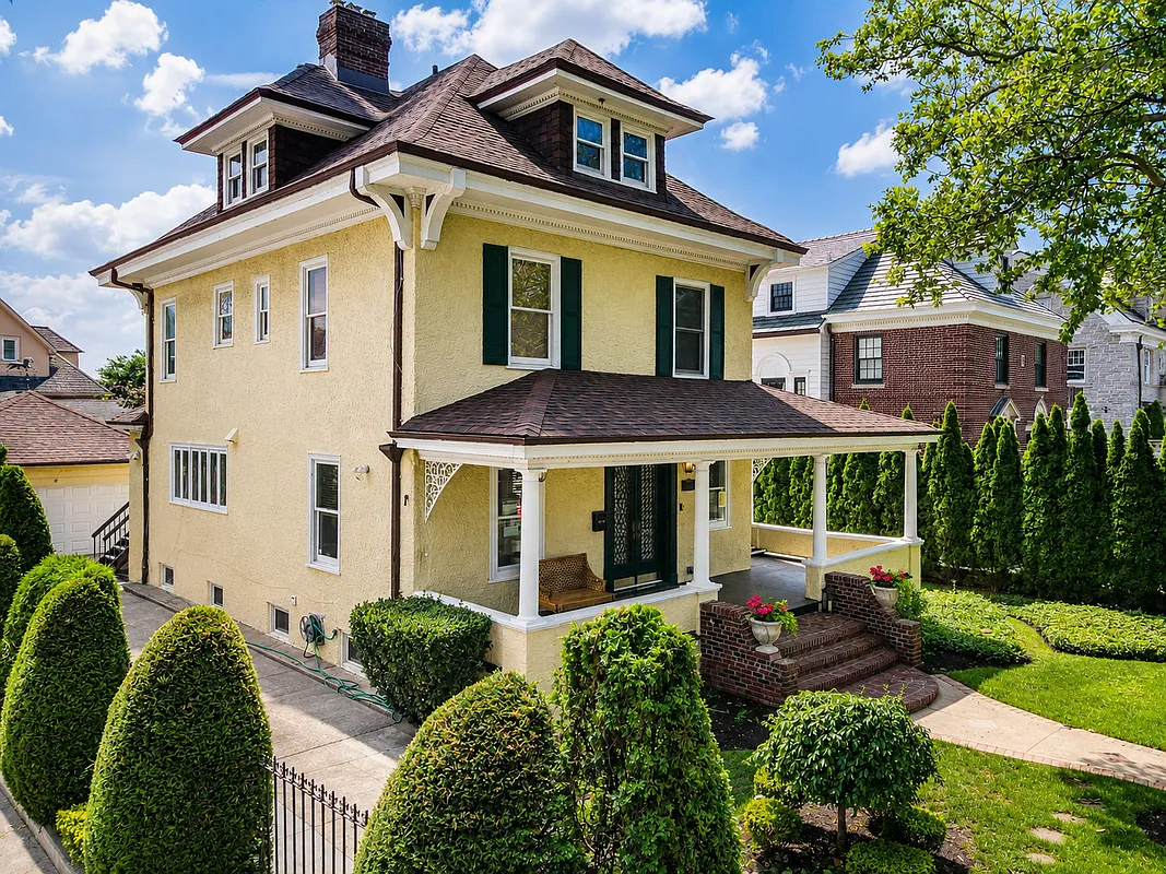 stucco covered house with front porch