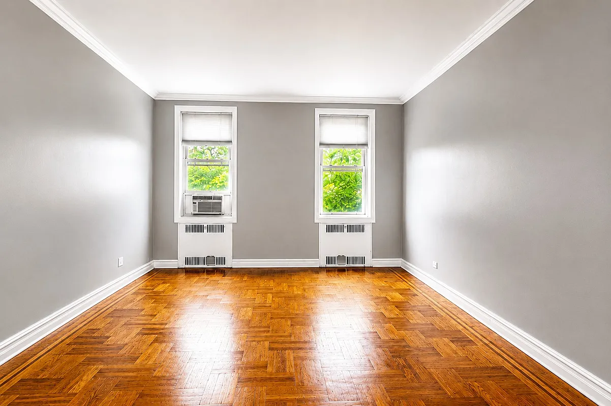 living room with two windows, wood floor