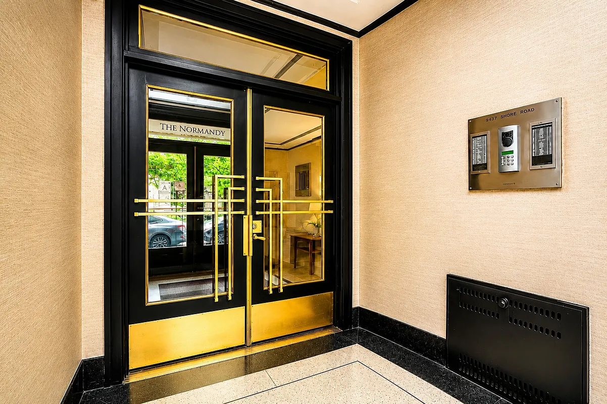entry with lobby doors, intercom system