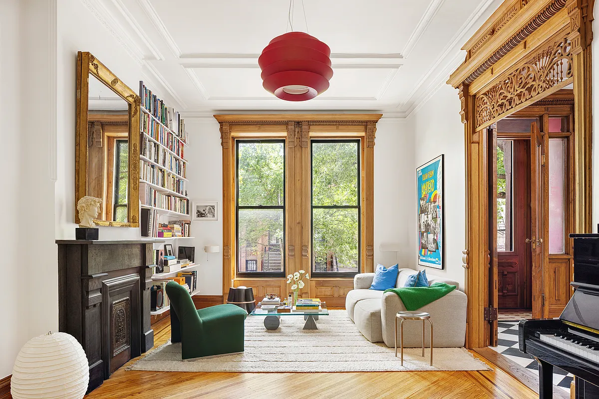 bed stuy - parlor with wood floor, stone mantel