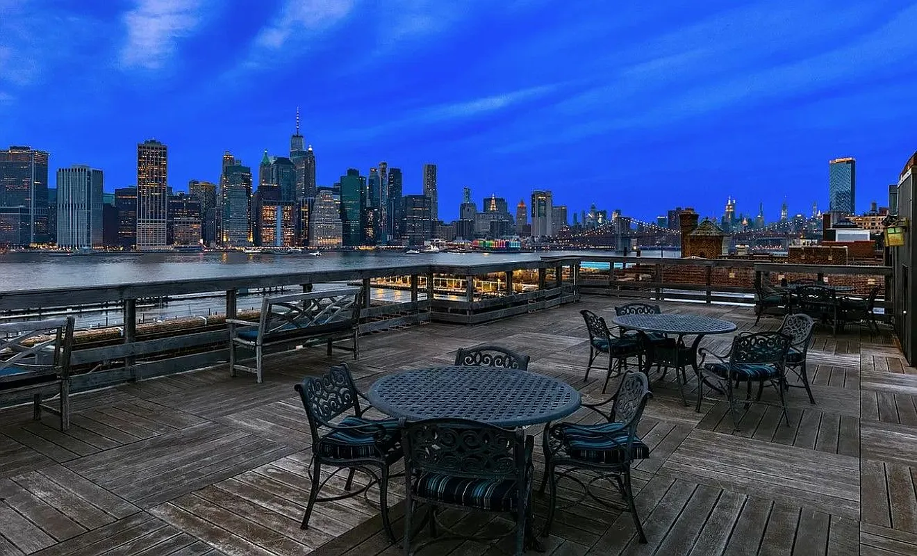 night view of the roof deck with view of manhattan