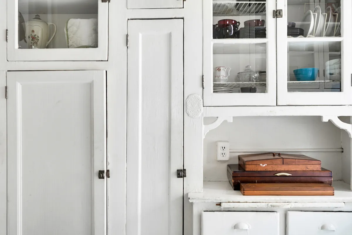 original cabinets with glass doors in kitchen