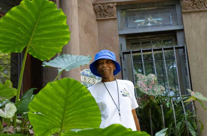 woman on her stoop in crown heights 