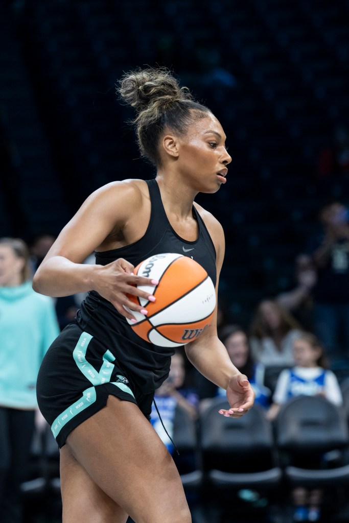 Betnijah Laney-Hamilton warms up prior to a game against the Dallas Wings.