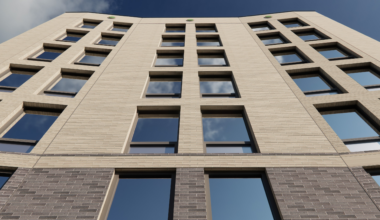 rendering of pale brick building