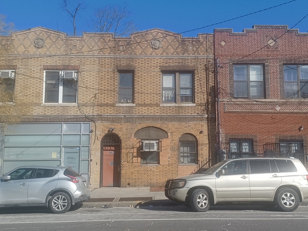 three two story brick buildings