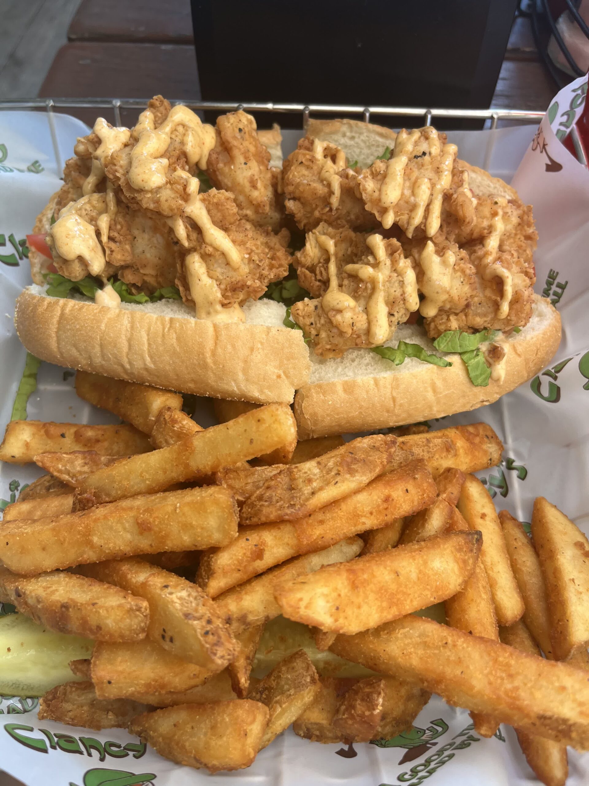 Po’ Boy sandwich and fries at Clancy’s Irish Sports Pub