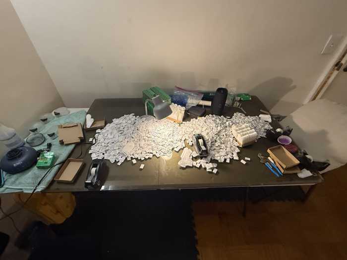 filled glassines on a table