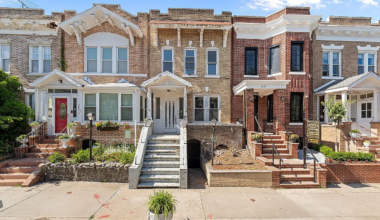 pale brick rowhouse exterior