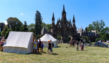 tents and tables set up near the gates to green-wood cemetery