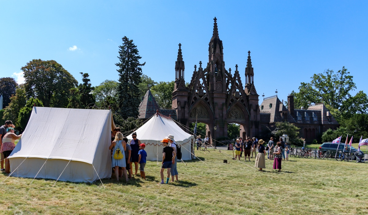 tents and tables set up near the gates to green-wood cemetery