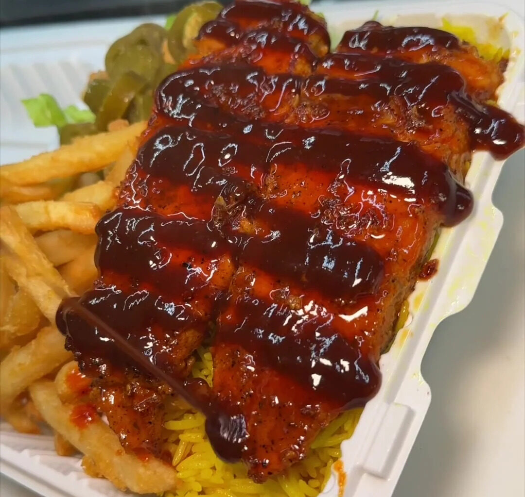 Why People Are Claiming This NYC Halal Joint Serves The Best Salmon Platter In The Entire City