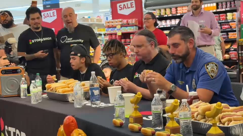 FDNY and NYPD battle it out during hot dog eating contest on Staten Island