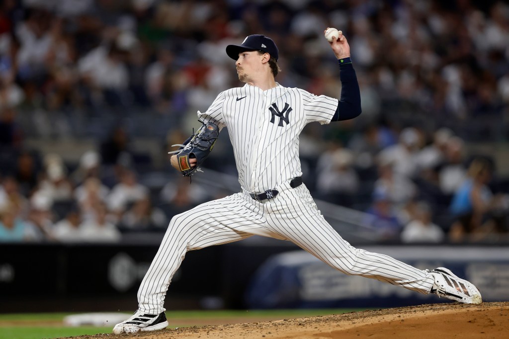 Max Fried of the New York Yankees pitching against the Boston Red Sox.