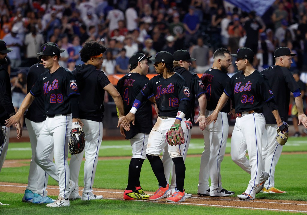 The New York Mets celebrate a win over the Nationals.