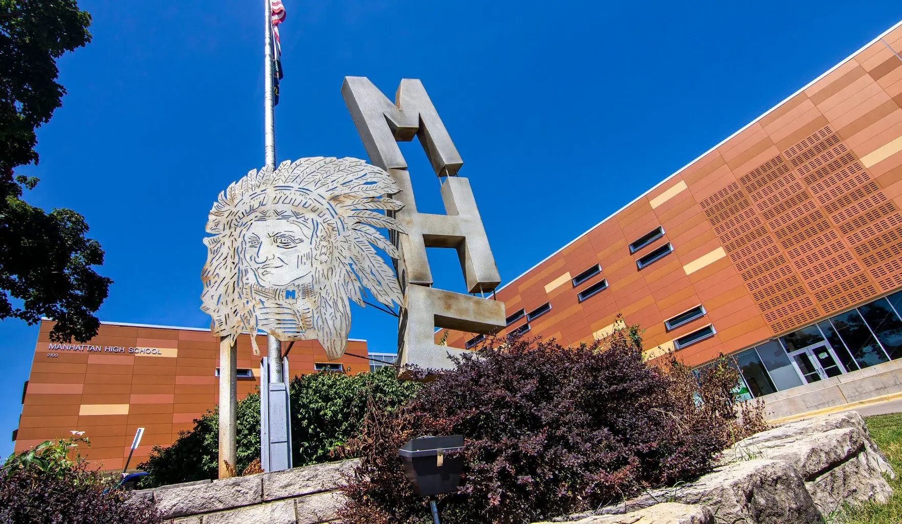 Two juveniles arrested after drug, battery reports at Manhattan High School