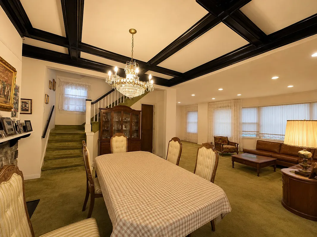 living room with beamed ceiling