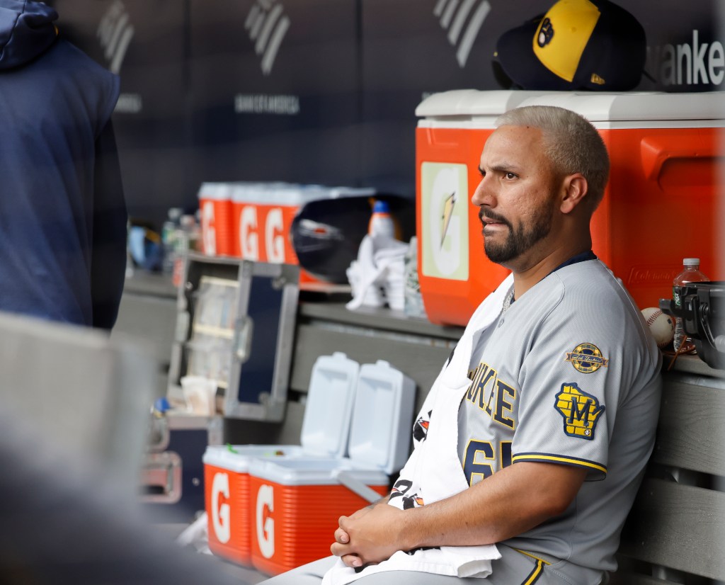 Milwaukee Brewers pitcher Nestor Cortes in the dugout.