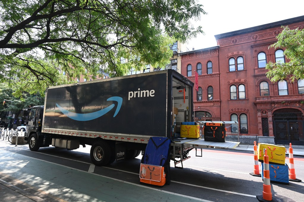 An Amazon Prime delivery truck with its rear door open, parked on Second Ave. in the East Village.