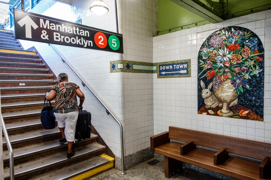 Steps with a mosaic at the East 180th Street Subway station on Thursday, July 21, 2016, in New York City.