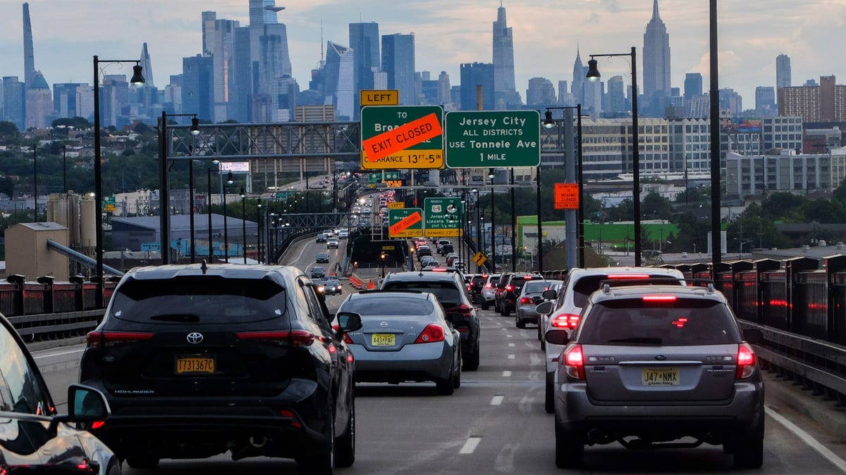 The Empire State Building and Tourist District are seen while Traffic jam is reported along the route to New York City on August 17, 2022, in Jersey City, New Jersey. New York Governor. Kathy Hochul is proposing a congestion pricing plan to raise billions of dollars in revenue for public transit projects and also decreasing traffic jam in Manhattans tourism district and financial center. (Photo by Eduardo MunozAlvarez/VIEWpress)