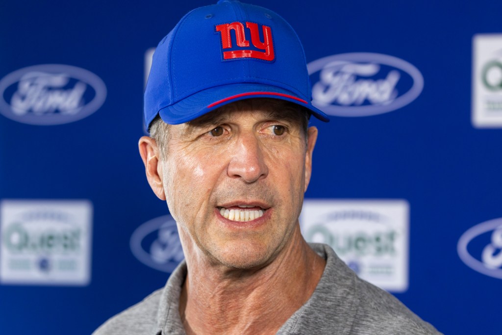 New York Giants head coach John Harbaugh speaks with the media.