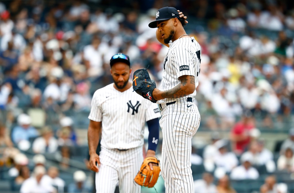 New York Yankees pitcher Camilo Doval reacts after giving up runs to the Minnesota Twins.