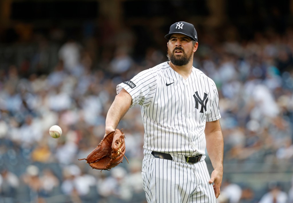 New York Yankees pitcher Carlos Rodón reacts on the mound.