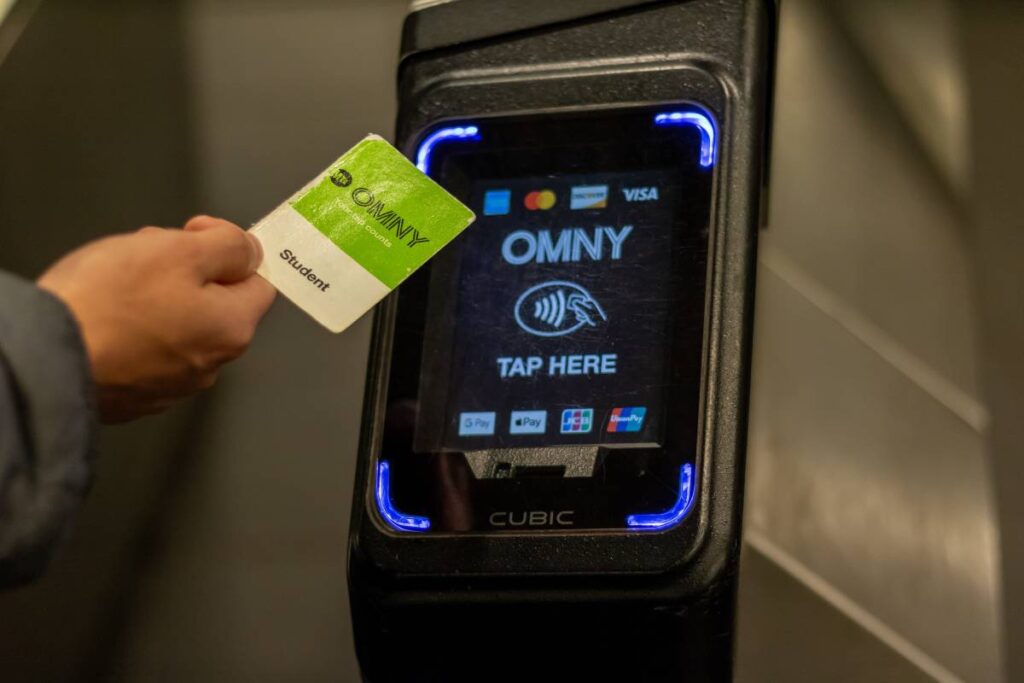 nyc student tapping a student omny card
