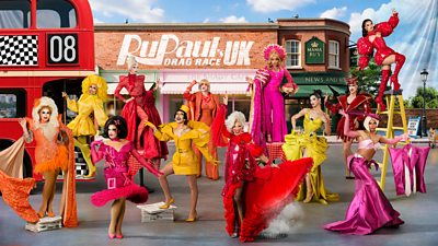 Key art- The Drag Race contestants in various poses in a scene on a street, in the background is a brick highstreet with a pub and cafe. There is also newspapers scattered across the flor and big red bus