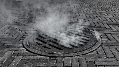 Three people were caught on video climbing out of a Manhattan manhole near Penn Station. (Unsplash)