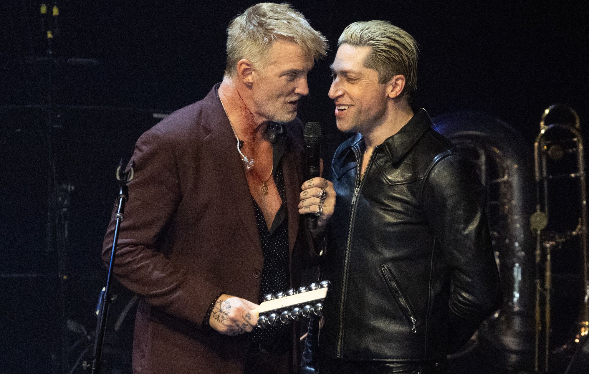 Josh Homme and Michael Shuman of Queens of the Stone Age perform onstage during a 51st season taping of Austin City Limits (Photo by Rick Kern/Getty Images)