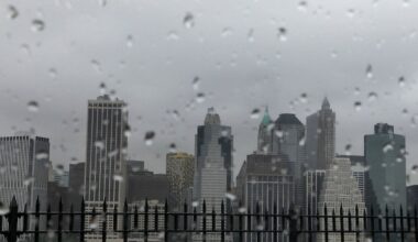A rainy New York City skyline.